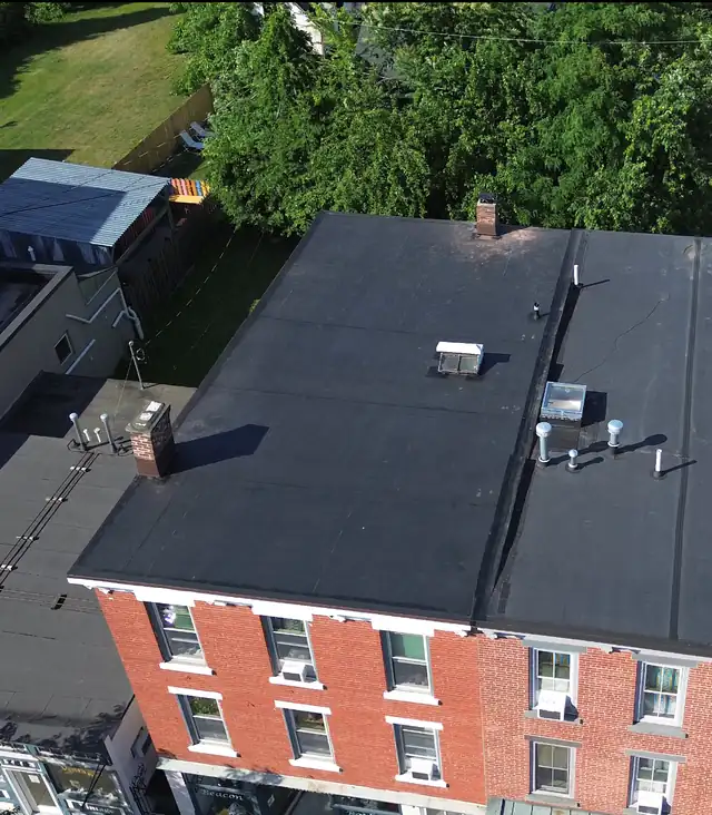 Flat membrane roof on a brick building